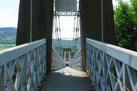 over the chain bridge at Melrose in Scottish Bordersの写真素材