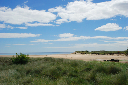 sea and beach on river Aln estuary at Alnmouthの写真素材