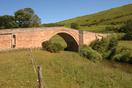 Weetwood bridge over Till near Wooler in Northumberlandの写真素材