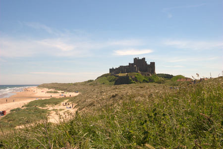 Bamburgh castle and beach in summer in Northumberlandの写真素材