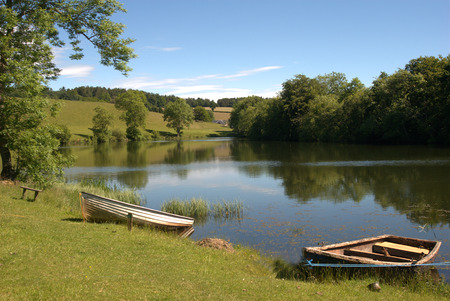 Clerklands loch and boats in Scottish Bordersの写真素材