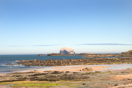 view to Bass Rock from beach at North Berwickの写真素材