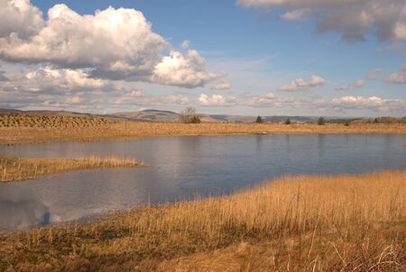 small loch & clouds near Selkirk in Scottish Bordersの写真素材