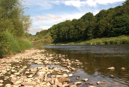 looking up river Tweed at Darnick in summerの写真素材