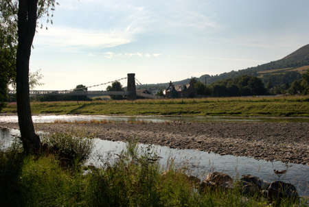 chainbridge over river Tweed at Melrose from Gattonsideの写真素材