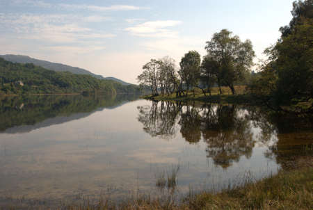 Loch Achray in Trossachs in late summerの写真素材
