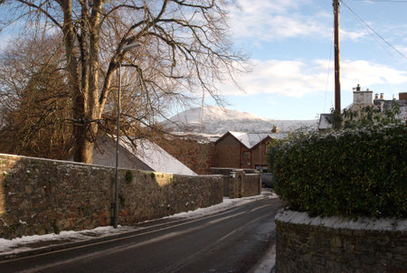 view of Eildon hills from main street in Darnick in winterの写真素材