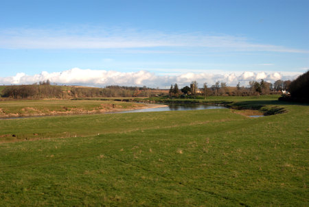 view of river Tweed and Carham churchの写真素材