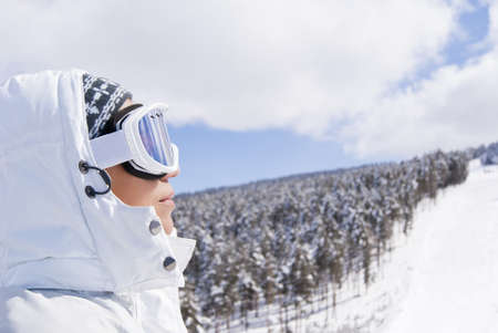 Portrait of beautiful skier looking forward on the route in Sarikamisの写真素材