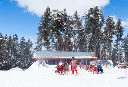 SARIKAMIS, TURKEY - MARCH 3: Skiers relaxing in forest cafe with food and mulled wine near ski route on March 3, 2011 in Sarikamis, Turkey のeditorial素材