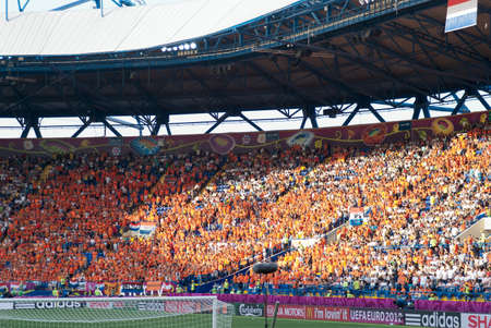 KHARKOV, UKRAINE - JUNE 9: Netherlands fans on stadium before beginning of match on June 9, 2012 in Kharkov.のeditorial素材