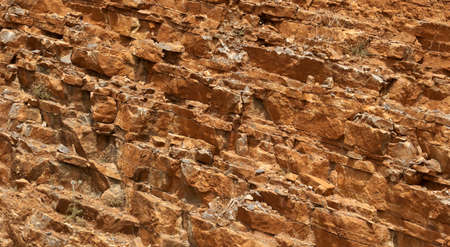 Natural cracked stone texture closeup backgroundの写真素材