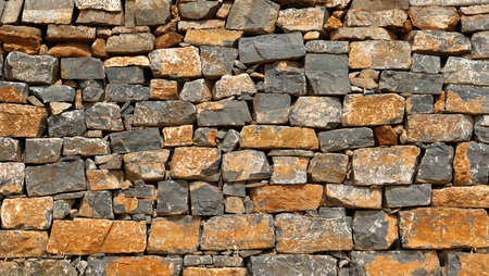Closeup of old brick wall background texture の写真素材