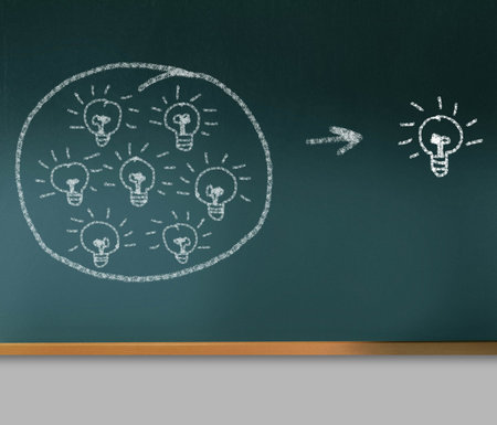 Light bulb drawn on blackboard