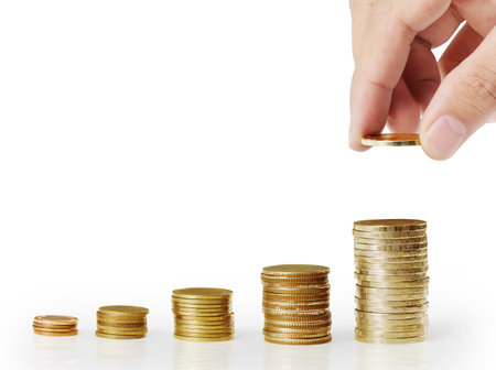 Hand put coin to money staircase