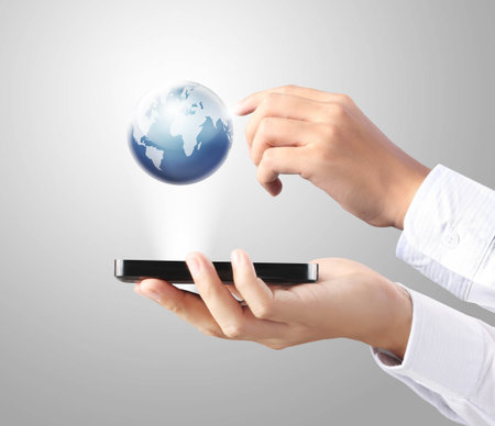 Modern mobile phone in hand isolated