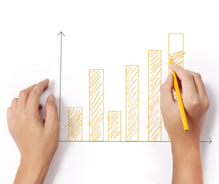 Business man drawing a graph 