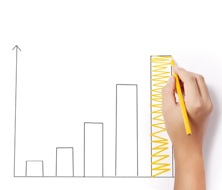Business man drawing a graph 