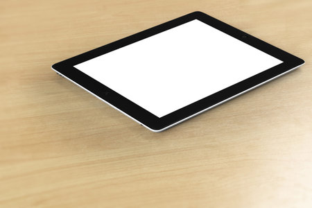 tablet on the table wooden 
