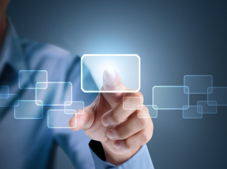  Business man pressing a touchscreen button 
