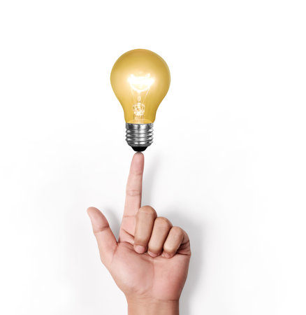 Ideas light bulb in a hand 