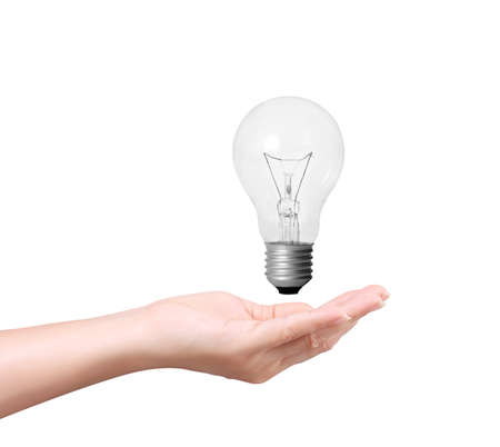 Ideas bulb light on a hand の写真素材