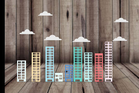 Building simulation in several colors on woodの写真素材