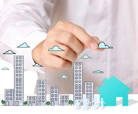 Building in a hand businessmen の写真素材