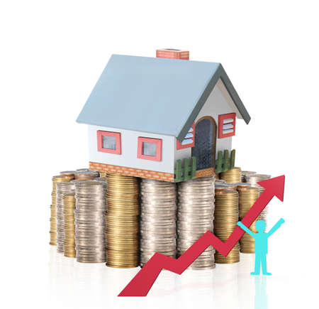 Mortgage concept by money house from coins の写真素材
