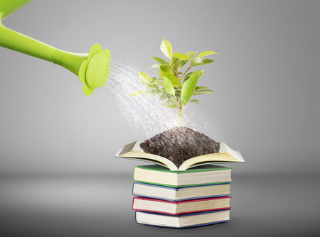 Books and watering pot ,Ecology concept