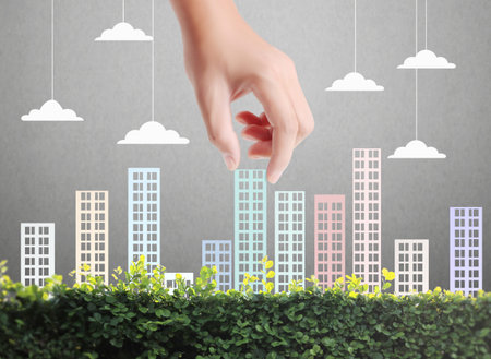 Building in a hand businessmen