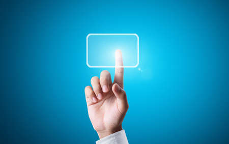 hand pressing a touchscreen button の写真素材