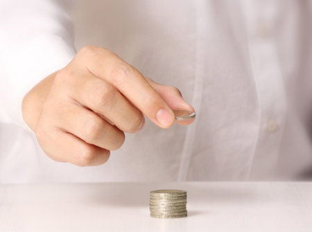 Hand put coin to money ,Business idea 