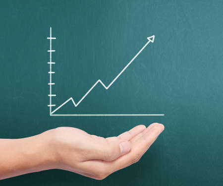 Graphs on a hands of businessmenの写真素材