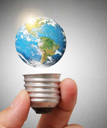 Ideas bulb light in the hand の写真素材