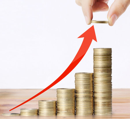 Hand put coin to money ,Business idea の写真素材