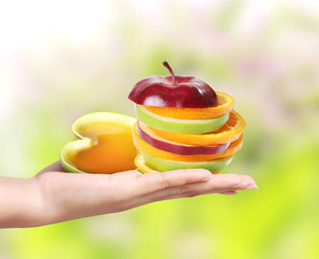 Hands holding a fruit in handの写真素材