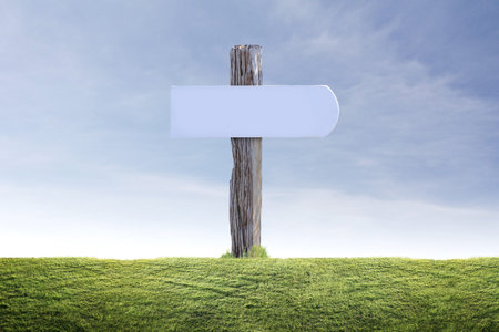 Old a wooden signpost  isolatedの写真素材