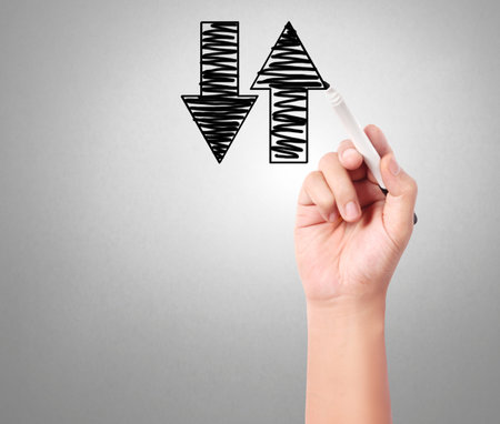 Business man drawing a graph の写真素材