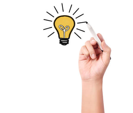 Hand drawing the light bulb の写真素材