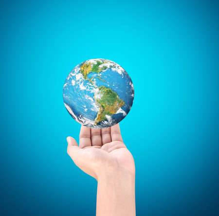 Man holding global in hands, Eco conceptの写真素材