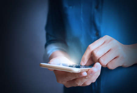 Modern mobile phone in the handの写真素材