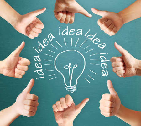 Human hands showing thumbs, body parts conceptの写真素材