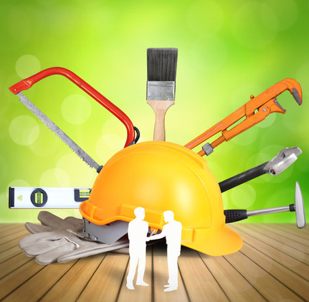 Yellow helmet plastic safety and tools , protection concept
