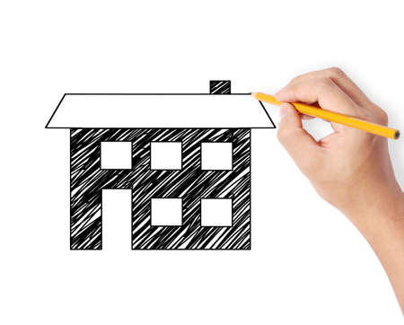 Hand drawing a house modelの写真素材