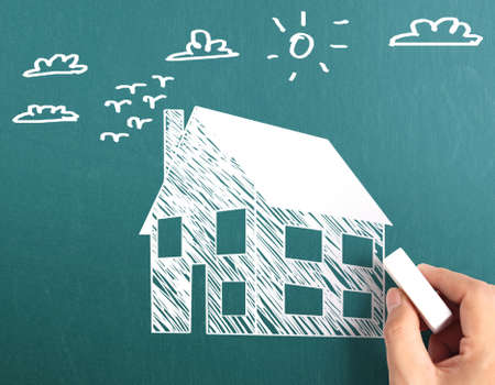 Hand drawing a house modelの写真素材