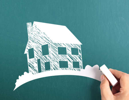 Hand drawing a house modelの写真素材