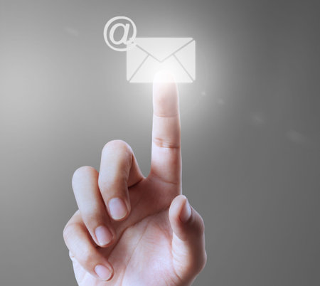 pushing a button on a touch screen interfaceの写真素材