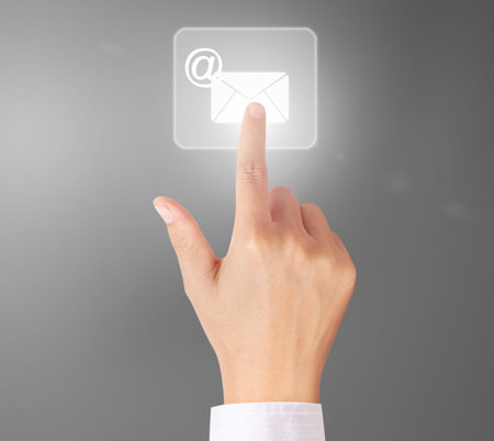 pushing a button on a touch screen interfaceの写真素材