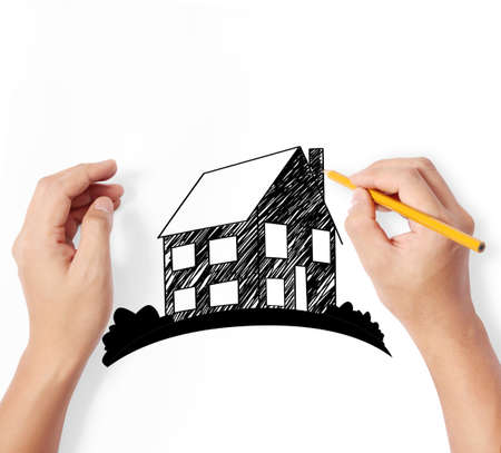 Hand drawing a house modelの写真素材